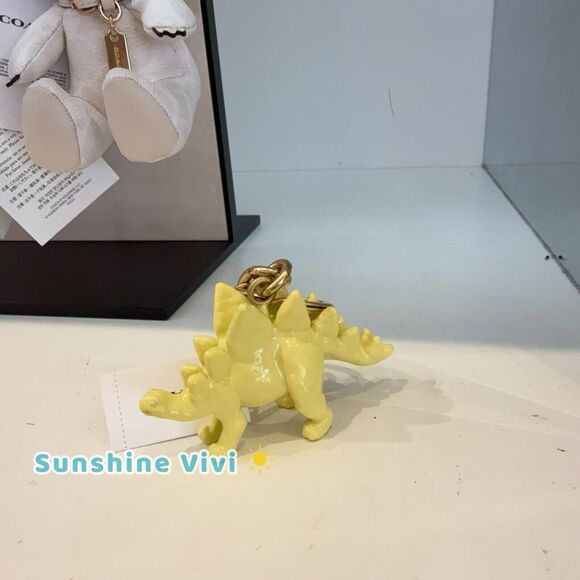 NWT Coach CAX77 Keychain Stegosaurus Bag Charm Brass/Yellow
